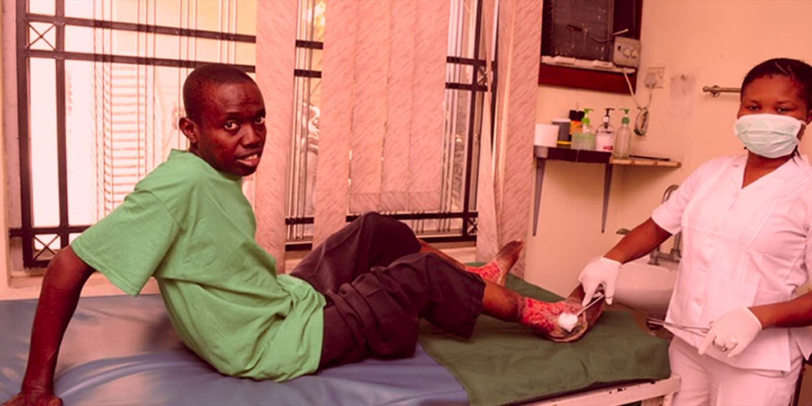 Patient receiving leg ulcer treatment