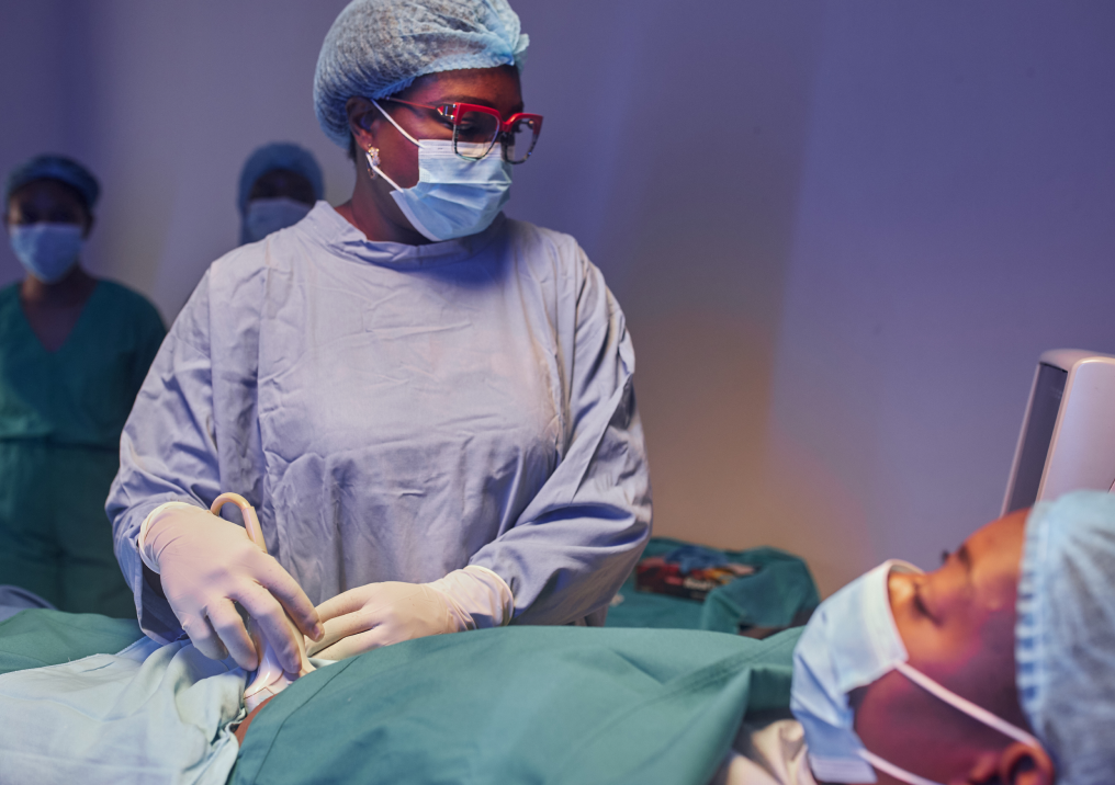 A clinician performing a prenatal diagnosis procedure.