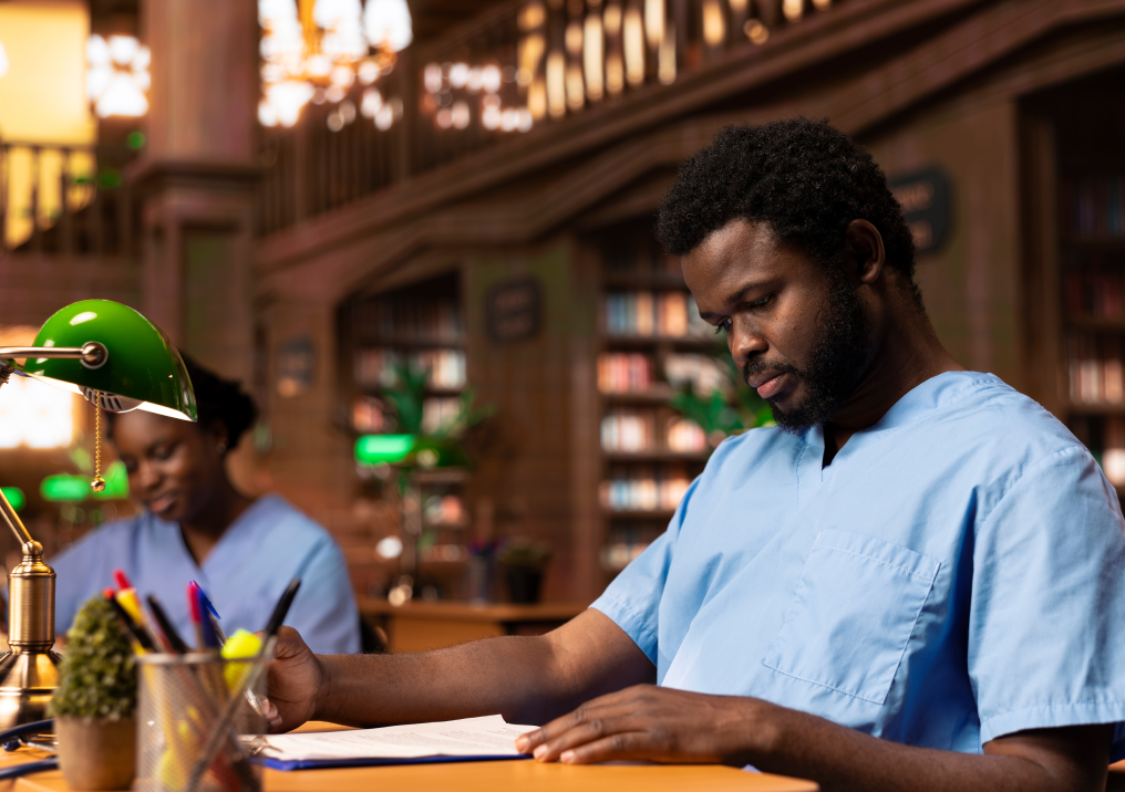 Readers studying at library desks
